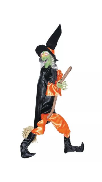 Leg Kicking Witch With Broom Halloween Decoration